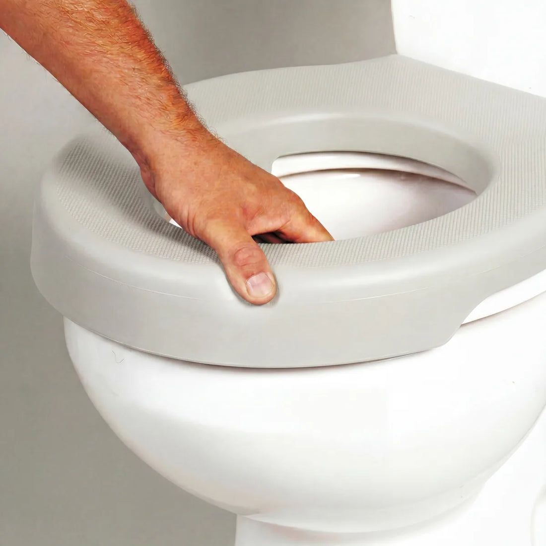 Asiento elevador de WC blando